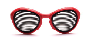 Cool red sunglasses from the 1980s in red with black grid instead of lenses