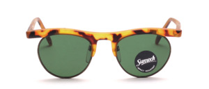 Combination sunglasses by Sunrock with temples and upper rim made of tortoiseshell-colored acetate and metal rim in antique gold