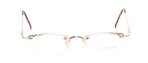 Finely crafted semi-rimless frame for women made of stainless steel in gold with a fine, colorful decor