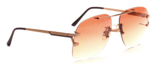 Large, totally up to date rimless sunglasses of the 70s with 4 long screws for correction glazing