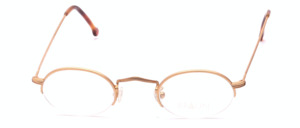 Oval half rim eyeglasses in matt gold with fine engravings