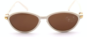 White, slightly oval sunglasses with gold details