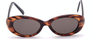 Oval sunglasses in a tortoise color look by Tropical