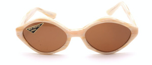 Oval edgy acetate sunglasses in horn color with brown mineral glass lenses by Selecta