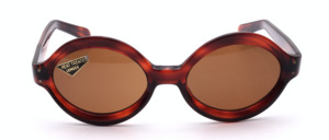 Oval 70ies sunglasses in demi amber with a thick frame und brown mineral glass lenses
