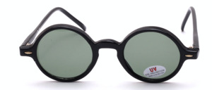 Round black sunglasses made of plastic with green lenses from the 1990s