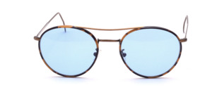 Panto eyeglasses in antique gold with cell rim in tortoise optic and light blue lenses