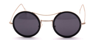 Elegant round metal Sunglasses in matte Gold color with a black cellrim and double bridge, made in Italy