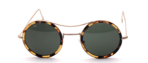 Elegant round metal Sunglasses in matte Gold color with a black yellow cellrim and double bridge, made in Italy