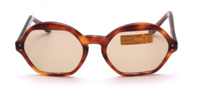 Of the hand of the french design icon Paulette Guinet is this vintage treasure from the late 1960s in havannabrown, oval shape with silver studs