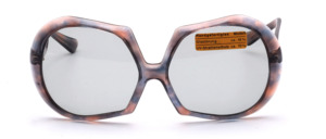 Of the hand of the french design icon Paulette Guinet is this vintage treasure from the late 1960s in grey gradient, half round, half square shape with silver studs