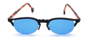 Oval semi-rimless sunglasses in black with Havana brown temples; elegant 90s vintage-style design without nose pads; blue lenses; made in Germany