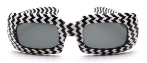 Angular vintage sunglasses made of substantial acetate, featuring a stylish black-and-white look and grey lenses
