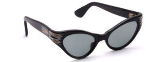 209<br />
Vintage 1950s 'Cat Eye Butterfly' sunglasses (Model 4715) made of black acetate, featuring silver and gold detailing at the temple hinges and grey lenses