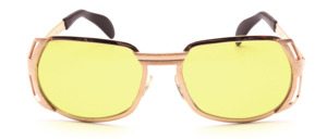 Vintage 1970s gold-tone sunglasses by Neostyle (Model 308), featuring a glossy finish combined with matte elements
