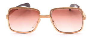 Vintage 1970s angular sunglasses by Neostyle (Model 310) in gold, featuring a matte finish combined with glossy elements