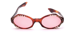 264<br />
Original vintage 1950s cat-eye butterfly sunglasses by Milappe, crafted from translucent Havana brown acetate