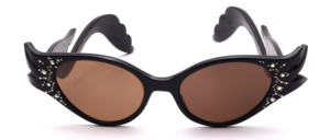 Original vintage 1950s cat-eye/butterfly sunglasses made of black acetate, featuring elegant rhinestone detailing at the temple hinges and a distinctive jagged shape