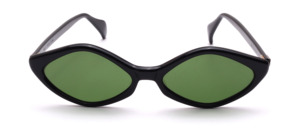 Vintage black diamond-shaped women's glasses with green lenses, made in the 1960s