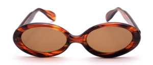 Oval sunglasses made of substantial Havana brown acetate with brown lenses, manufactured in the 1960s
