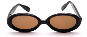 Oval sunglasses made of chunky black acetate with brown lenses, manufactured in the 1960s