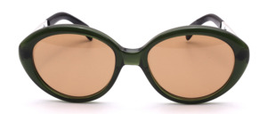 Stylish 1960s vintage cat-eye sunglasses made of translucent green acetate, featuring silver temples and brown mineral lenses