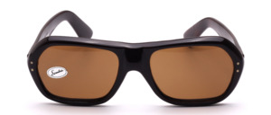 1960s vintage sunglasses made of sturdy brown acetate, featuring a distinctive bridge and brown mineral lenses